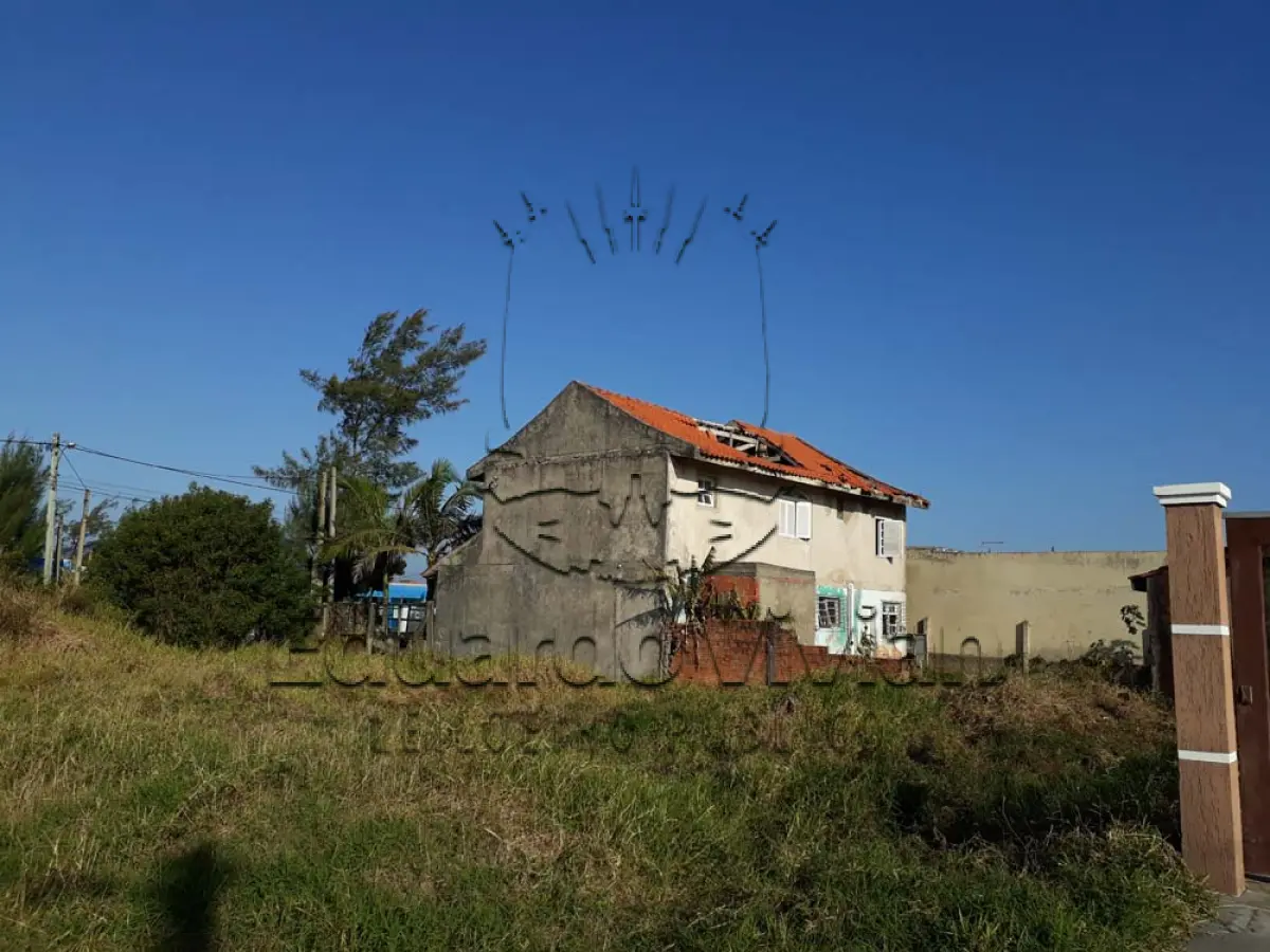 LOTE 001 - Casa em Tramandai, na Rua Andrade Neves, 2250