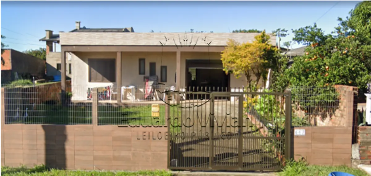 LOTE 001 - Uma casa e o respectivo terreno em Osorio,  na Av. Marcilio Dias, 665, sendo o Lote 10 da Quadra 23.