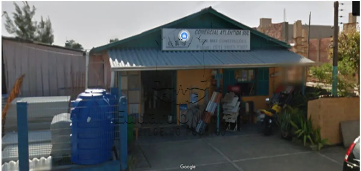 LOTE 001 - Em Atlântida Sul, o lote 26 da Quadra 145, e a respectiva edificação sobre o lote, situado na Rua Marambaia, nº 408, matrícula 34.218.