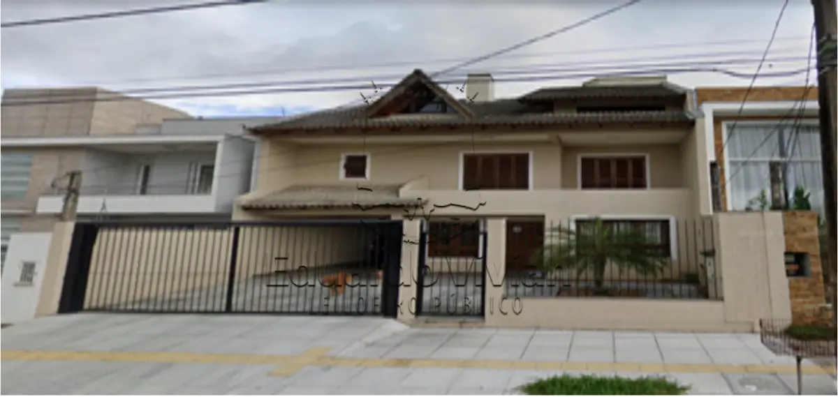 LOTE 001 - Uma casa em Canoas na Rua Henrique Kranen Filho, nº 46-Loteamento Montserrat, matrícula 76.888