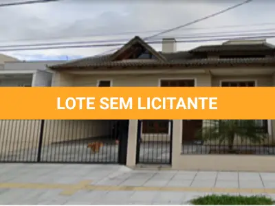 LOTE 001 - Uma casa em Canoas na Rua Henrique Kranen Filho, nº 46-Loteamento Montserrat, matrícula 76.888