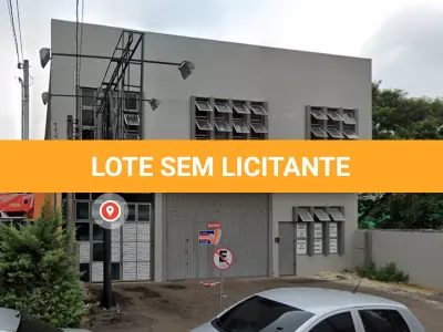 LOTE 001 - Em Novo Hamburgo, no centro da cidade, na rua Tupí, nº 1229, um prédio comercial com dois pavimentos com cerca de 563,00 m2 de área construída.