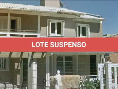 LOTE 002 - CASA EM NOVA TRAMANDAI NA RUA MATO GROSSO, 808.
