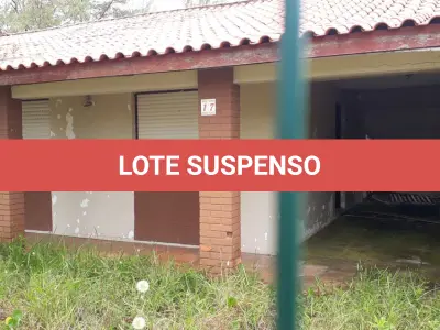 LOTE 001 - VENDA JUDICIAL DE RESIDÊNCIA EM ATLÂNTIDA SUL NA RUA ITAPEMA, 17.