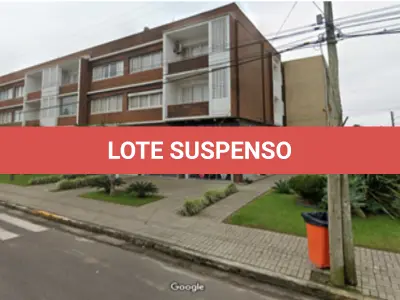 LOTE 001 - Em Atlântida, na Avenida Central, nº 241, no Edifício Netuno, o apartamento 04, matricula no RI de Capão da Canoa nº 20.282, no Bloco C.