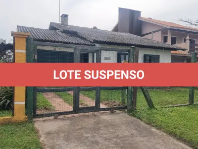 LOTE 001 - Em Imbé, no Balneário Presidente, na Rua Tiradentes, o Lote 26 da Quadra E-05, casa e terreno, a qual recebeu o número 1054