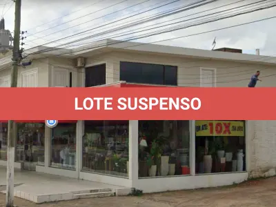 LOTE 001 - Em Imbé, na Av. Paraguassú, 1675, lote com 712,50 m2, edificação com 516,00 m2 averbada na matrícula 93.877