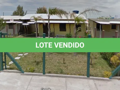 LOTE 001 - Em Magistério, na Rua Rolante, nº 375, na quadra formada pelas vias Luciana de Abreu, Rui Barbosa e Viamão, sendo o Lote 20 da Quadra B-39.