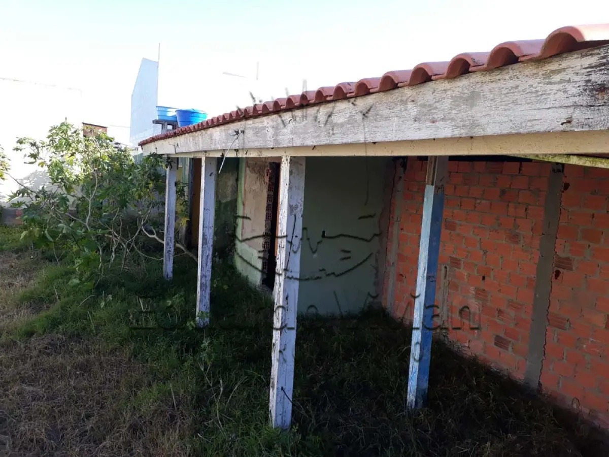 LOTE 001 - Casa em Tramandai, na Rua Andrade Neves, 2250