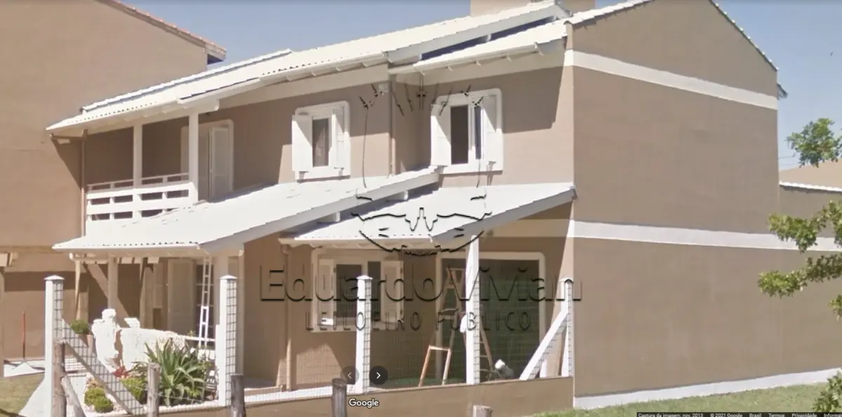 LOTE 002 - CASA EM NOVA TRAMANDAI NA RUA MATO GROSSO, 808.