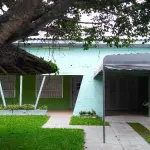 LOTE 02 - "Uma casa em alvenaria com garagem, localizada na Travessa Padre Feijó, 1179, em Tramandaí