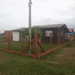 LOTE 003 - VENDA JUDICIAL DE RESIDÊNCIA EM BALNEÁRIO HARMONIA, NA RUA 28, Nº 74