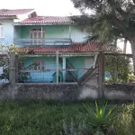 LOTE 001 - Casa em Tramandai, na Rua Andrade Neves, 2250