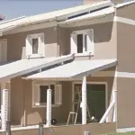 LOTE 002 - CASA EM NOVA TRAMANDAI NA RUA MATO GROSSO, 808.