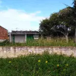 LOTE 001 - VENDA JUDICIAL TRABALHISTA - CASA EM BALNEÁRIO MAGISTÉRIO  NA RUA OSÓRIO, 675.