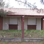LOTE 001 - VENDA JUDICIAL DE RESIDÊNCIA EM ATLÂNTIDA SUL NA RUA ITAPEMA, 17.