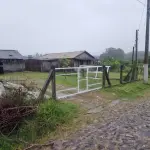 LOTE 001 - Em Tramandaí, no Loteamento Parque Emboaba, os lotes, 318, 319 e 320, da Quadra número 19, no Quarteirão formado pelas vias 01, 04, 05 (onde fazem frente) e 29, cada um com 300,00 m2, totalizando 900,00 m2.