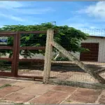 LOTE 001 - Uma Casa em Cidreira, na Rua Idalino Ferreira Fraga, (antiga Rua 06), nº 2056 e o respectivo Lote 07 da Quadra 92-B