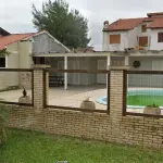 LOTE 001 - Casa em Imbé, na Rua Bagé sob o nº 1404.