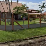 LOTE 001 - EM TRAMANDAÍ, NA TRAVESSA CEL. FLORES, 201.
