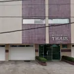 LOTE 001 - Em Capão da Canoa, no Edifício Residencial Thaís, na Rua Moema, nº 2893, o apartamento 1.301 e  os  O Boxes de Estacionamento 3-08 e 3-09.